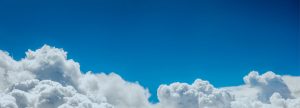 Blue sky with fluffy clouds